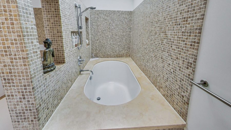 Main floor bedroom ensuite bathroom 
Large vanity and shower over soaking tub