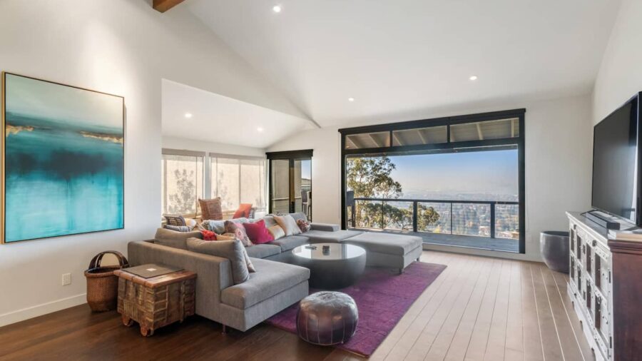 View upon entering the home with smart TV in the living room