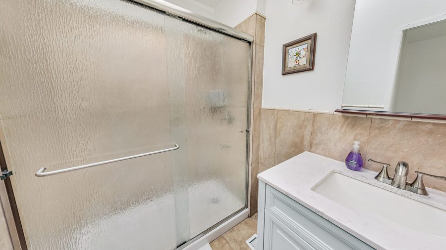 Bathroom with Spacious walk in shower.