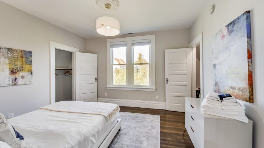 The front bedroom upstairs has a full bed and plenty of closet space