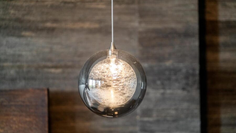 Master bedroom pendant reading lights on either side of the bed, individually switched