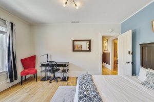 The blue room has a comfortable Queen size bed, desk, chair and Wardrobe to unpack and settle in.