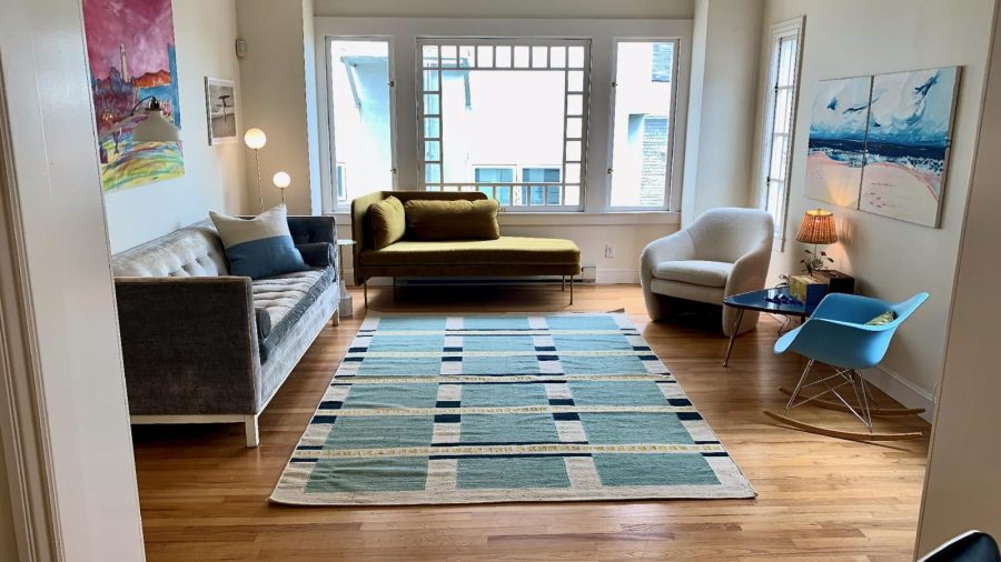 Spacious living room is well appointed and relaxing