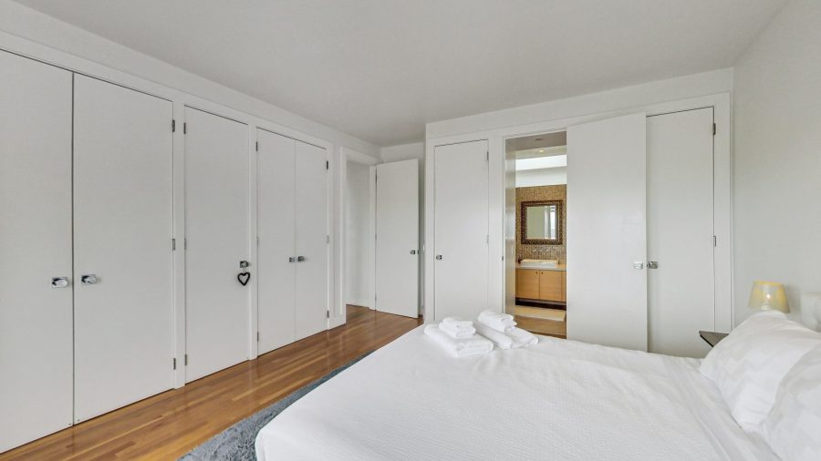 Main floor queen bedroom with en suite bath. 