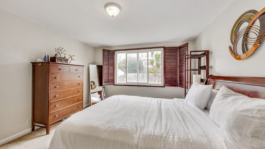 Master Suite "J" with a queen-sized bed and en suite full bathroom...
