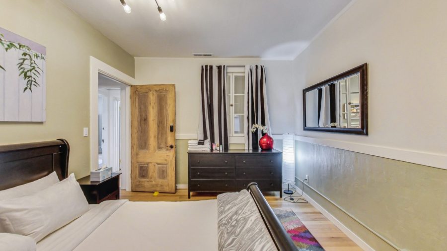 The green room has a desk to work, chair to sit, read or put on your shoes. and a dresser to unpack and relax.