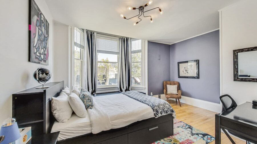 Front room, the Purple Room, is spacious, with plenty of light, a queen-sized bed and a view of a pretty street :-)