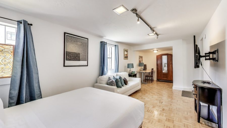 Large studio room is all yours.  It's very spacious featuring a Queen size bed, large sofa, TV and a desk.