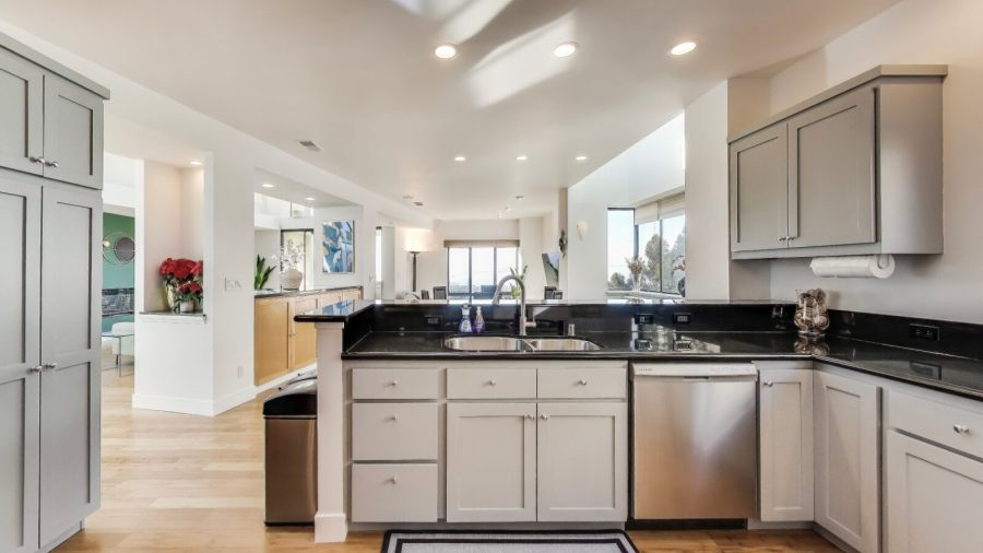 Kitchen counter bar, with seating for two, looking into the dining and family room