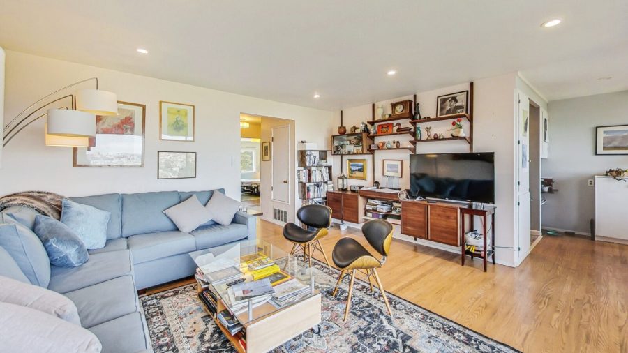 Spacious living room with roomy and comfy sofa. with a nice flat screen tv for entertainment or keeping up with current events.  Most likely the view will distract from anything on tv.