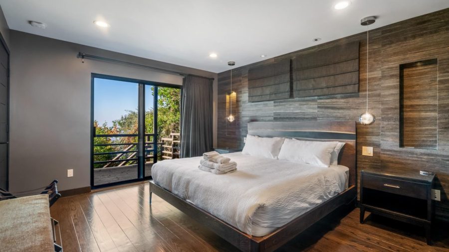 Master bedroom, to the right after descending stairs, with en suite bathroom and walk in closet with laundry room