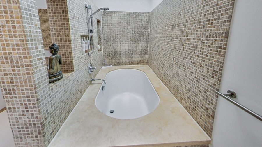 Main floor bedroom ensuite bathroom 
Large vanity and shower over soaking tub