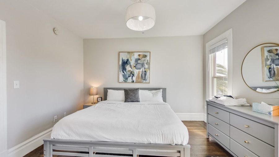 Upstairs middle bedroom features a king bed and large closet.