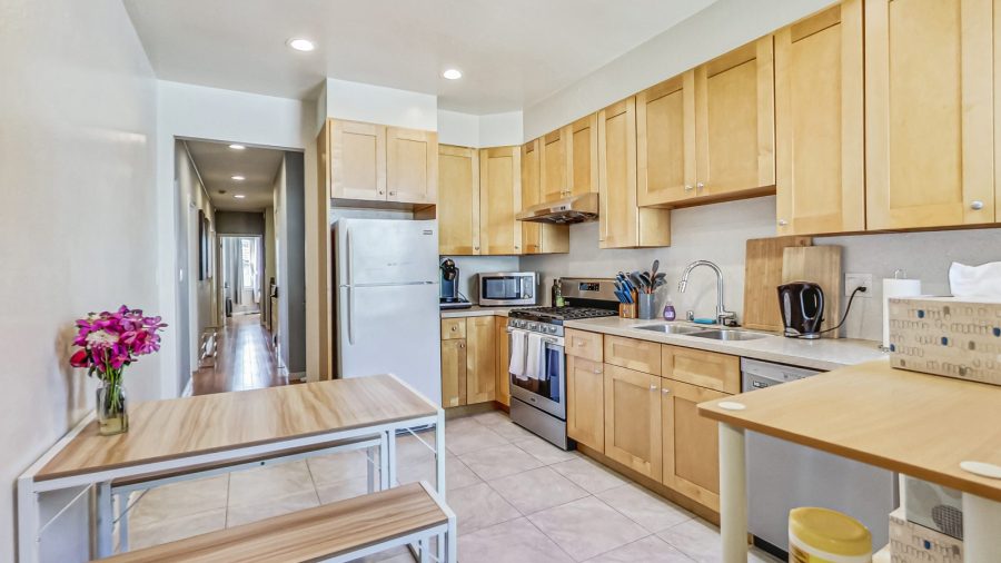Well appointed kitchen with a dining table for 4.  We provide coffee, tea, sweeteners and dishwasher pods.
