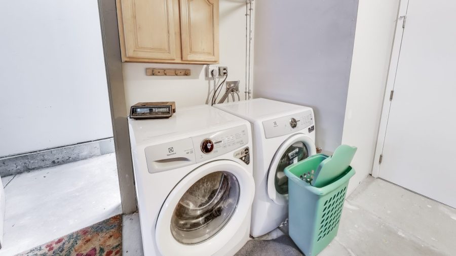 Shared laundry facilities just outside the studio door in the garage. 
We provide laundry pods for you to use. 