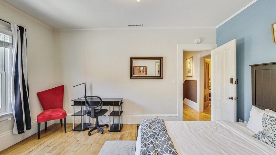 The other front bedroom is the blue room.  It also has a nice view on Noe street, a desk and a wardrome/bureau.
