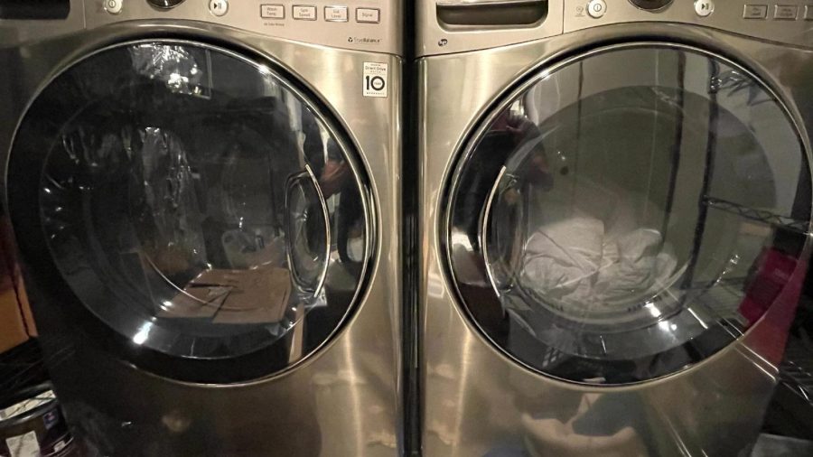 The laundry room is accessible through the master bedroom walk in closet