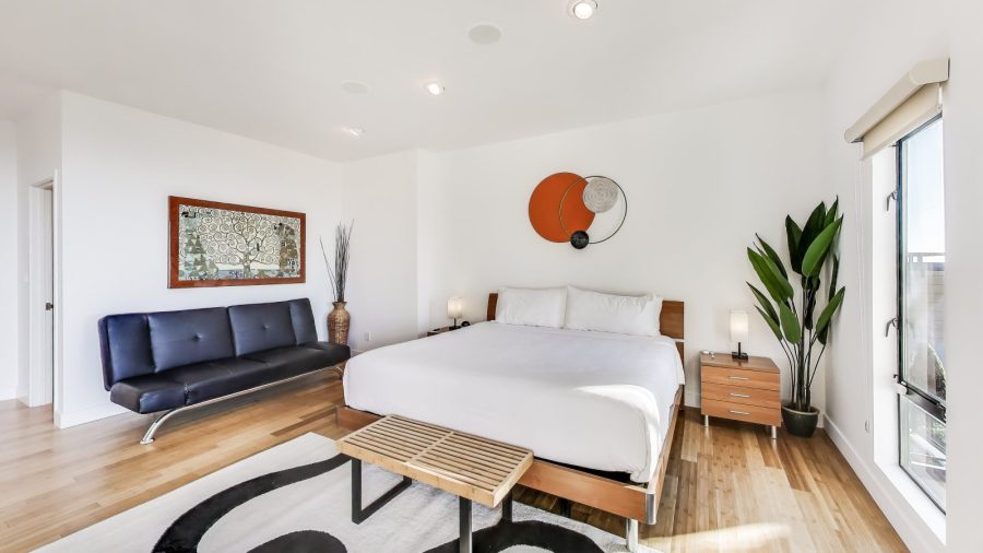 The master bedroom features a King size bed, Sofa, TV, en suite bathroom, large walk-in closet and private terrace with incredible views of the San Fransisco Bay