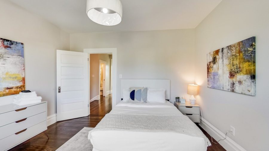 The front bedroom upstairs has a full bed and plenty of closet space