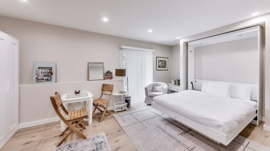 Your private studio oasis.  The murphy bed can be put up if you need more space.  Cozy dining /sitting space. Good for working or enjoying a morning cup of coffee.  The comfy chair next to the bed is great for reading. 