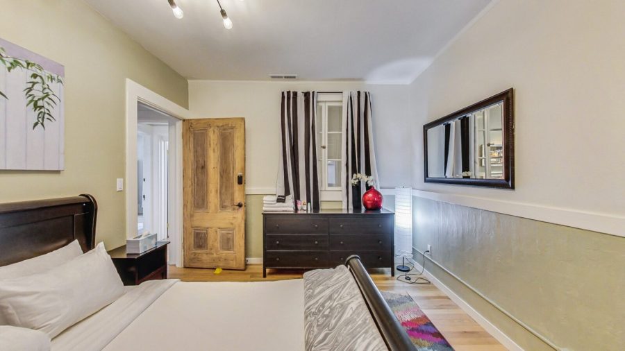 The green room has a desk to work, chair to sit, read or put on your shoes. and a dresser to unpack and relax.
