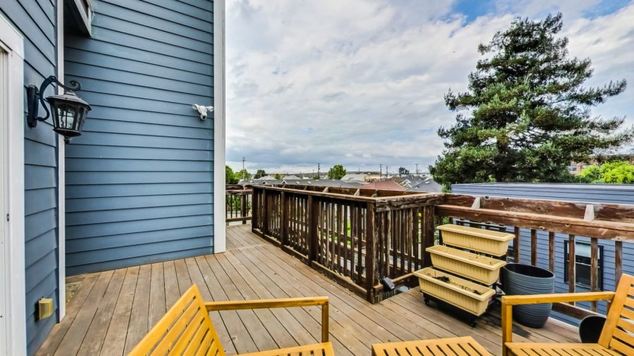 Back deck. Perfect for the morning coffee or an evening nightcap.  The wether is almost always perfect in West Oakland.