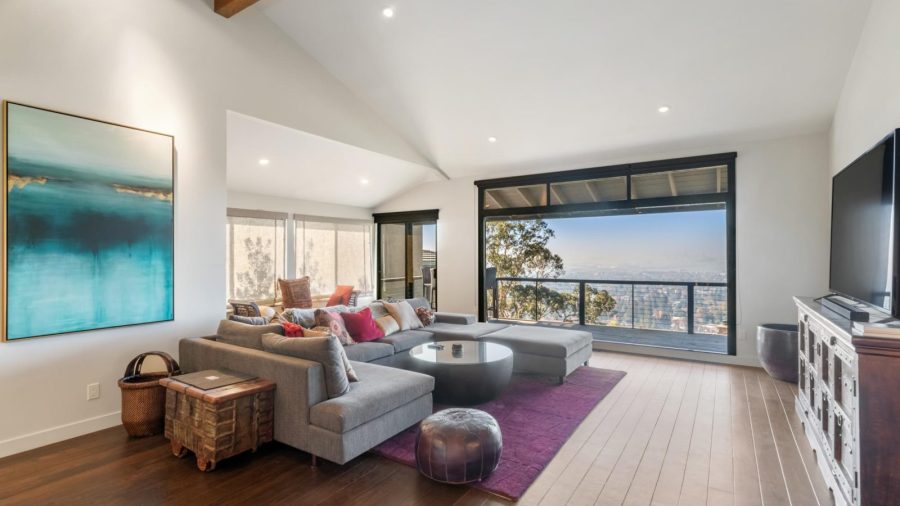 View upon entering the home with smart TV in the living room