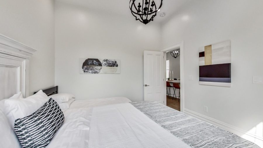 Master bedroom is off the kitchen.