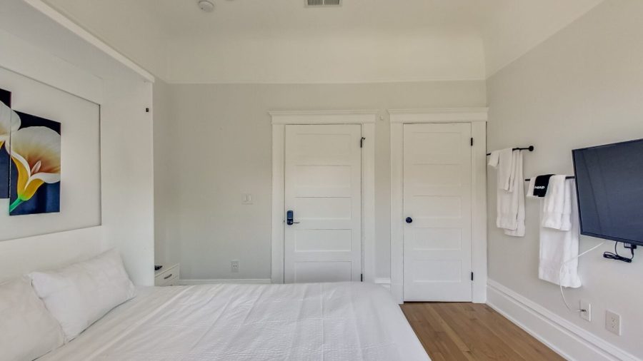 Business-ready smaller room also faces Castro St with DISH Network TV - need a desk? Just flip up the bed :-)
