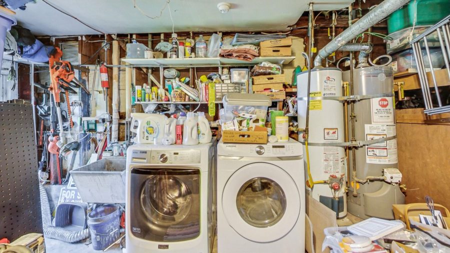 Laundry machines are in the garage.