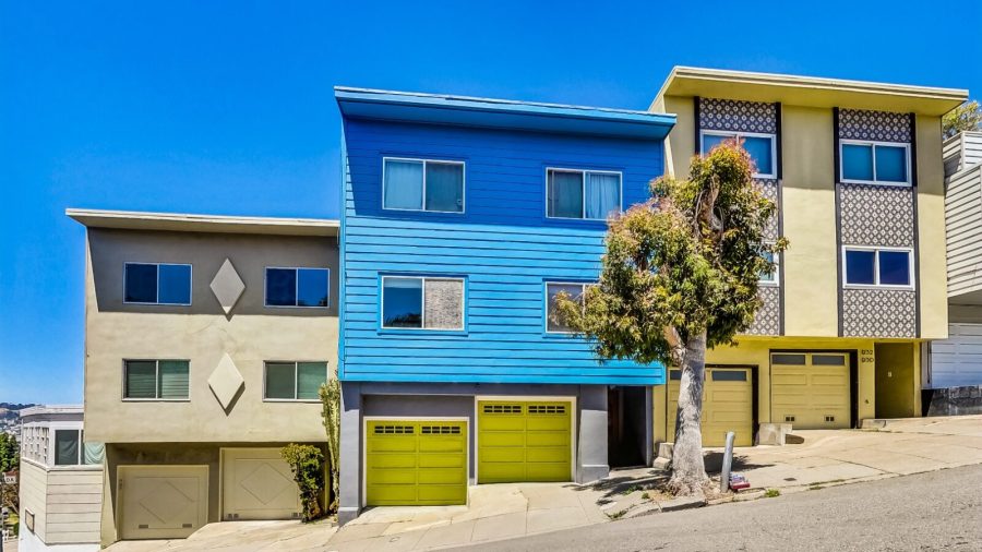 The lower unit in the blue house is where you'll find respite from a day running around the city.  Across from a park which offers a good spot to hike if you have energy left.