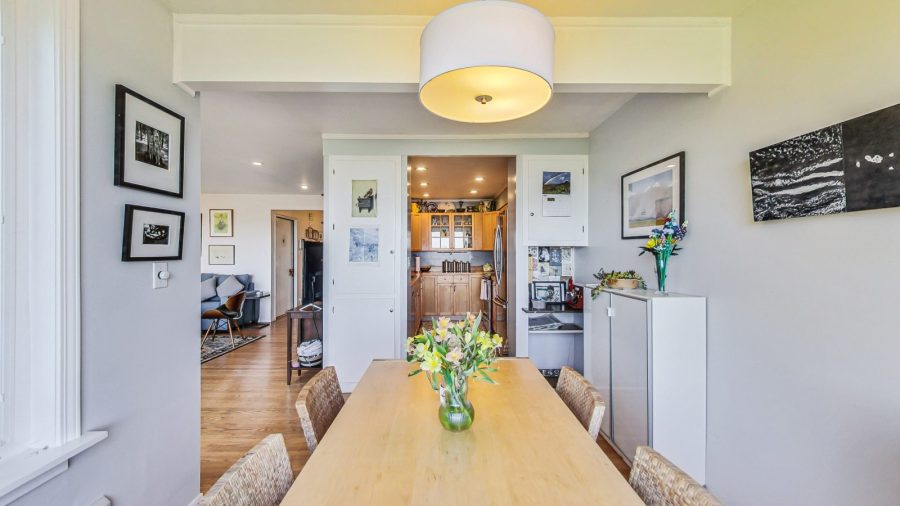 View of kitchen from dining table. 