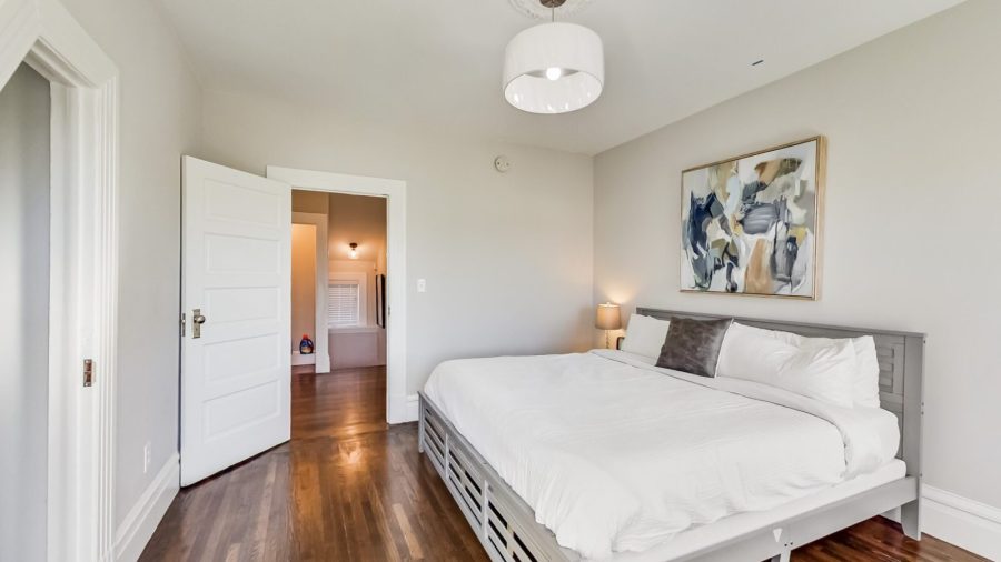 Upstairs middle bedroom features a king bed and large closet.
