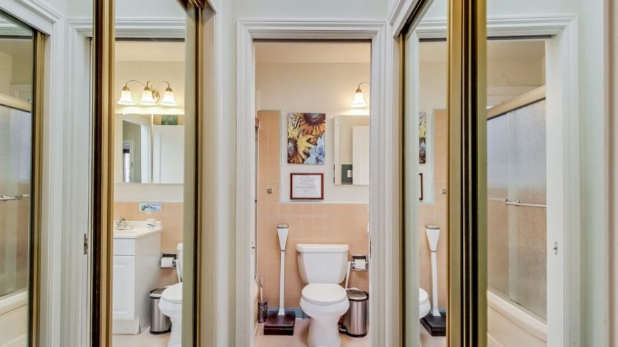 Private closets line the path to your en suite full private bath with tub and shower.