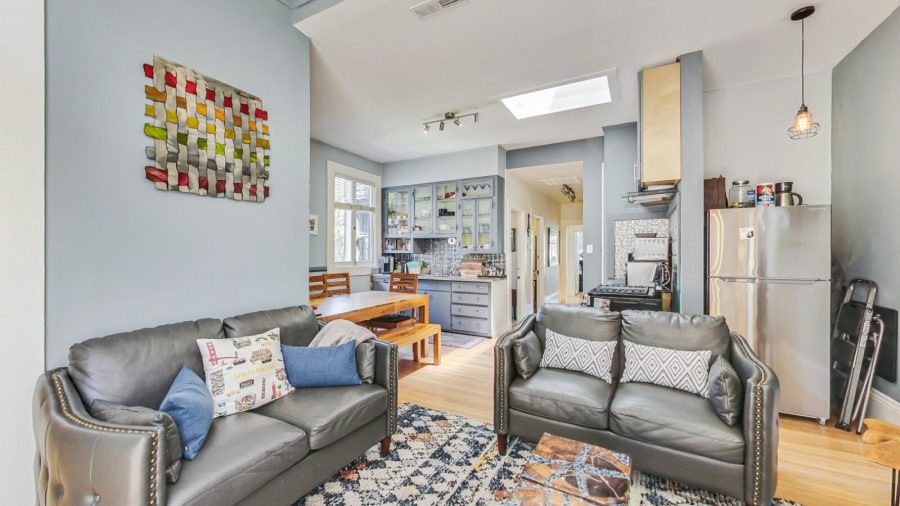 Open concept living/dining/kitchen area.  It feels spacious and separate but you can chat with each other while making dinner or dining or just hanging out.