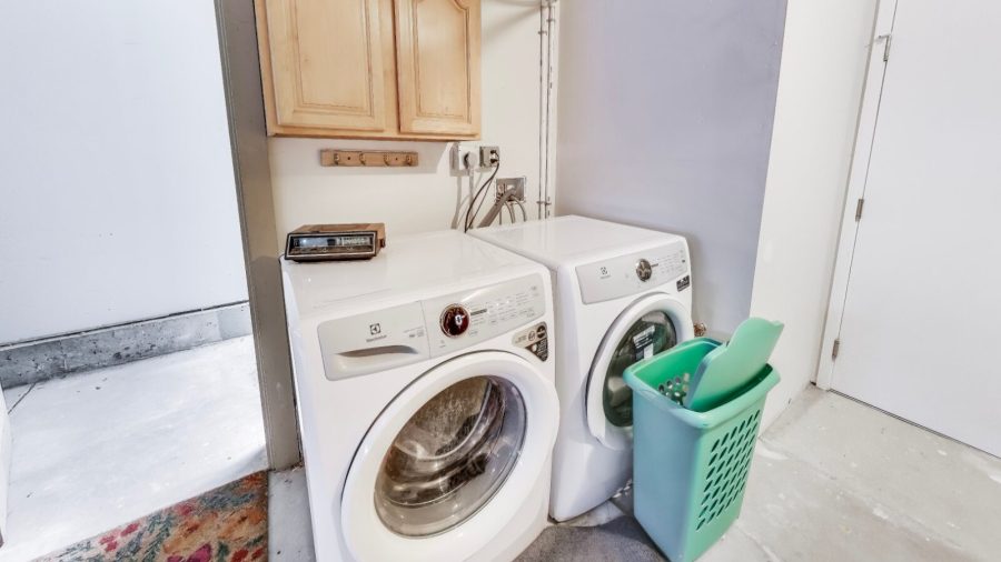 Shared laundry facilities just outside the studio door in the garage. 
We provide laundry pods for you to use. 