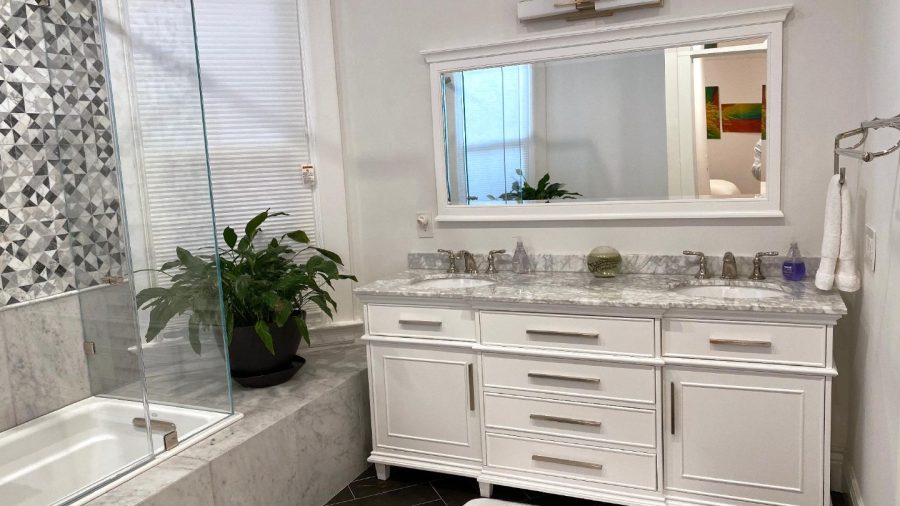 Private Master Suite en suite full bathroom with double vanity, shower and tub...