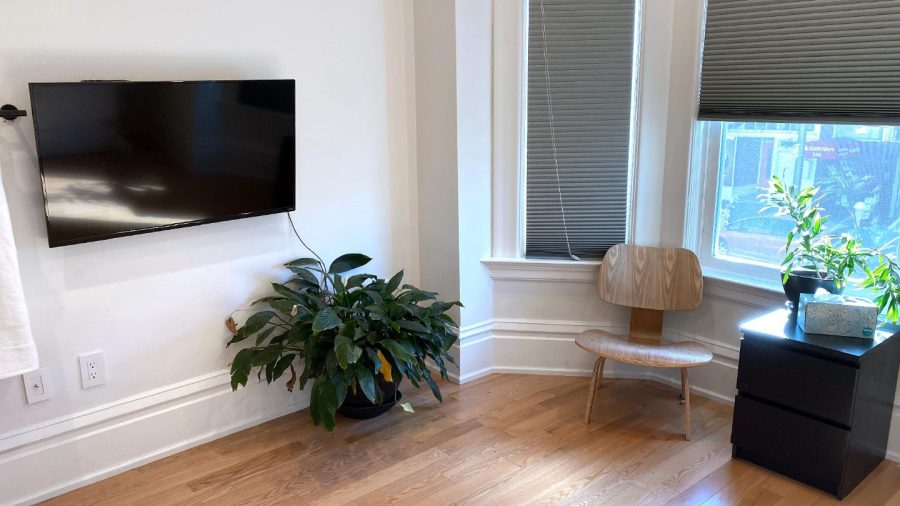 Business-ready room faces Castro St with DISH Network TV - need a desk? Just flip up the bed :-)