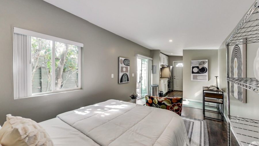 the 3rd bedroom is a separate cottage off the back with it's own bathroom and kitchenette