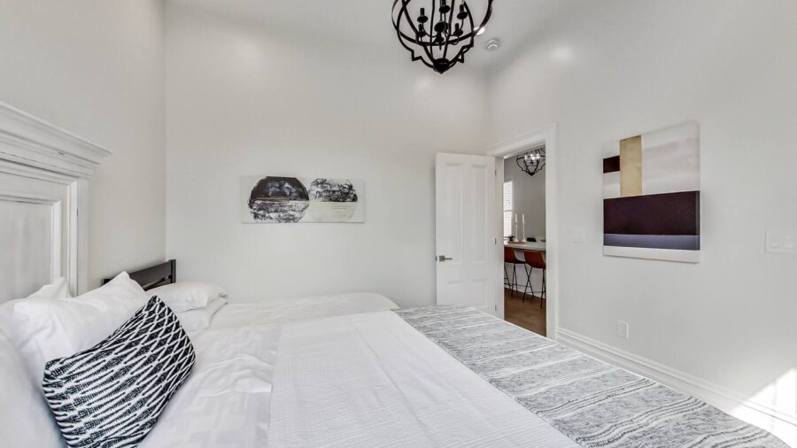 Master bedroom is off the kitchen.