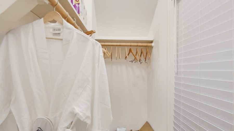 Main level bathroom closet.  The box has some house restock items in it in case you run out of shampoo or other consumables.