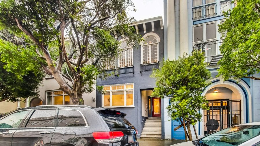 Front of Building. -- Parking is challenging in the neighborhood. Avoid a car if possible.  there are some parking garages nearby.