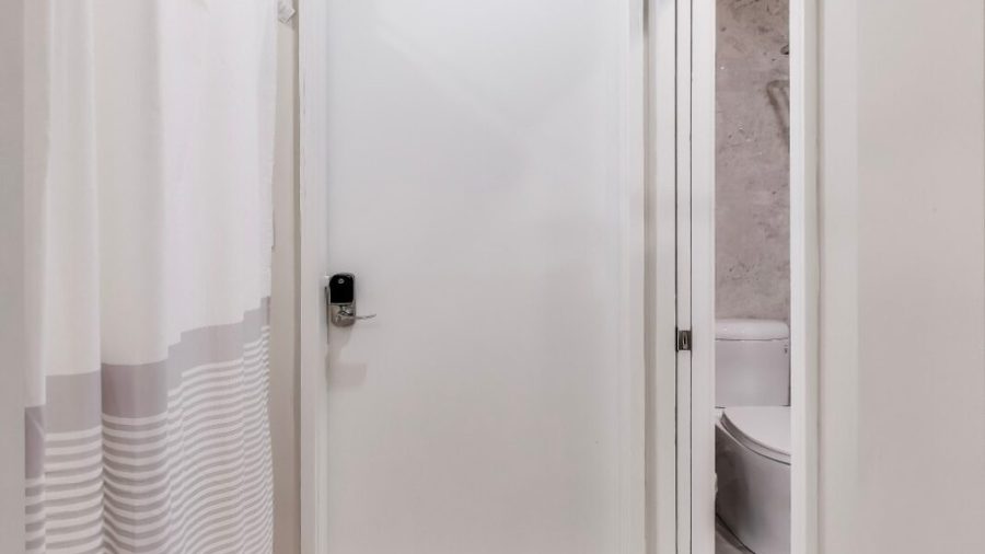 The entry door from the inside, . Bathroom is right by the entrance. 