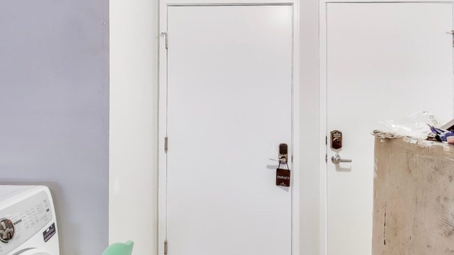 Just past the laundry machines, your door is the one on the left.