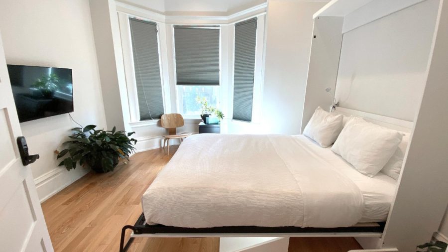 Business-ready smaller room also faces Castro St with DISH Network TV - need a desk? Just flip up the bed :-)