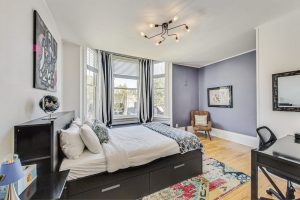 Front room, the Purple Room, is spacious, with plenty of light, a queen-sized bed and a view of a pretty street :-)