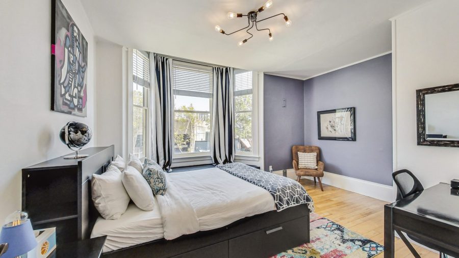 Front room, the Purple Room, is spacious, with plenty of light, a queen-sized bed and a view of a pretty street :-)