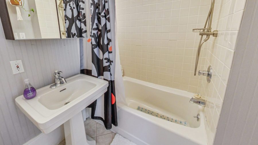 The far back bathroom has a tub if you want to soak or a traditional shower over tub  with Kiehl's bath products for a refreshing shower.