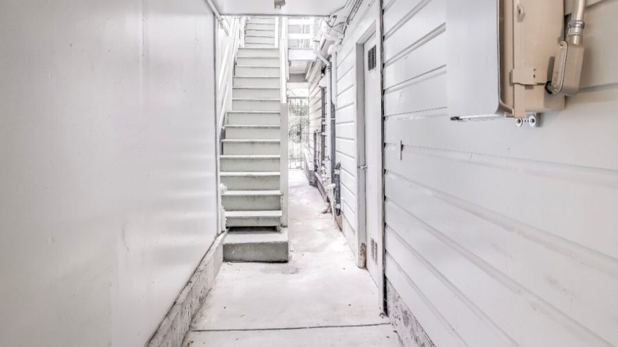 The first door on the right gets you into the garage where the laundry is.  just past the laundry is your private oasis.