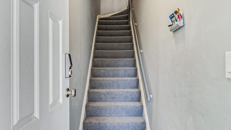 there is a shoe rack at the entry for you.  Please remove shoes and ascend up the flight of stairs to the 4 bedroom 2 bath flat.